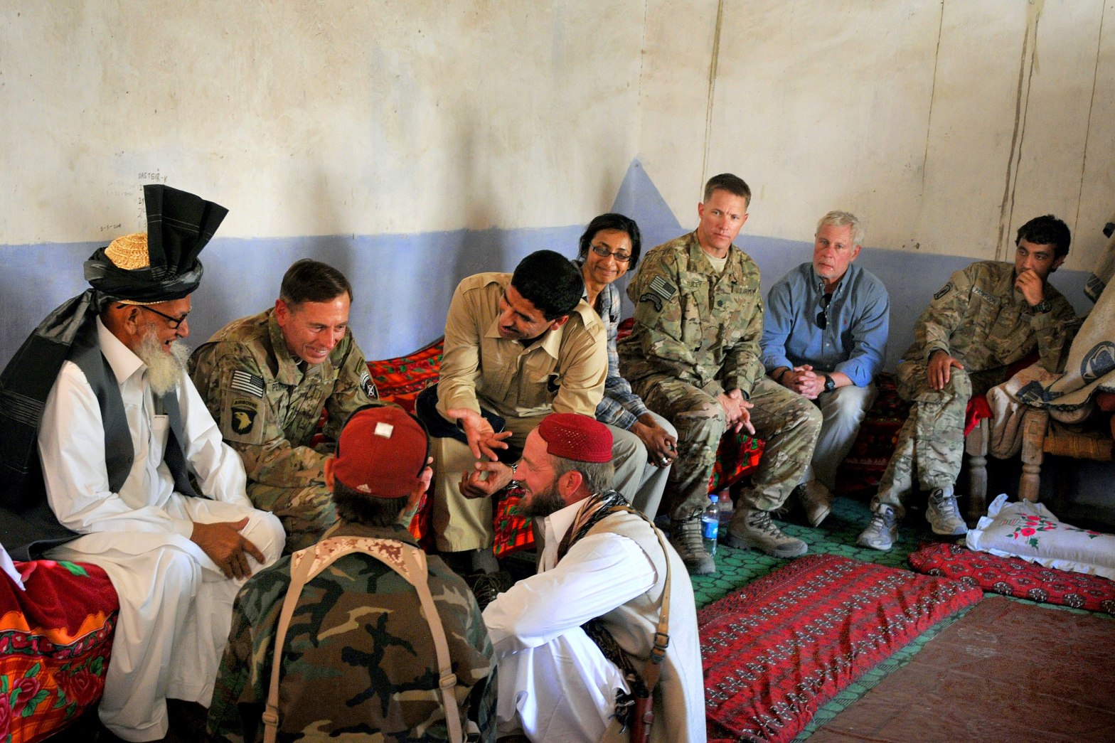 Gen. David H. Petraeus, commander of NATO and International Security Assistance Force troops in Afghanistan, visits the 1-16th Infantry 2nd Battalion at Qalat Mangwal, Afghanistan, during a battlefield circulation, May 8. ISAF, in support of the Government of the Islamic Republic of Afghanistan, conducts operations in Afghanistan to reduce the capability and will of the insurgency, support the growth in capacity and capability of the Afghan National Security Forces, and facilitate improvements in governance and socio-economic development, in order to provide a secure environment for sustainable stability that is observable to the population. (Photo by U.S. Navy Chief Petty Officer Joshua Treadwell) (Released)/Source: https://commons.wikimedia.org/wiki/File:Defense.gov_photo_essay_110508-N-SE516-040.jpg